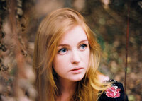 blonde-woman-in-autumn-garden-dandenong-ranges-portrait