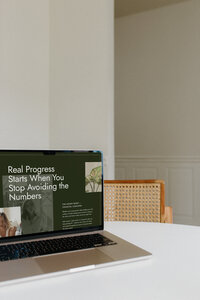 Showit website design for a money coach with a clean, trust-building brand layout.