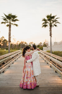 Groom kissing Brides forhead