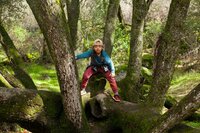 Outdoor lifestyle portrait reinforcing the playful, adventurous personality of the therapy practice brand
