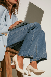 u6512682322_a_cropped_shot_of_a_person_sitting_on_a_wooden_st_19552e87-ae99-4dd2-bcbe-78847928eb9d_1