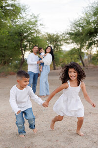 Vielmas family posed together outdoors during a Palm Springs family photography session