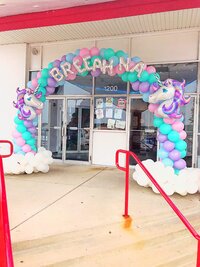 unicorn balloon arch for grand opening or storefront