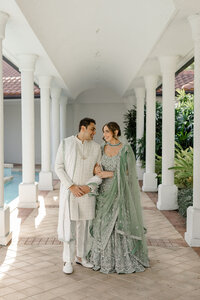 bride and groom embracing
