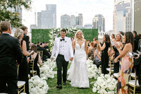 Bride and groom recession ending the Wedding ceremony at Nashville TN venue — planned by Weddings & Events by Raina