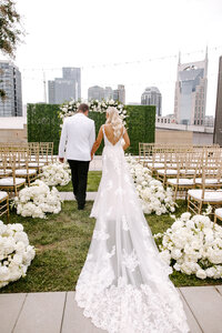Bride and Groom portrait walking down the isle Downtown Nashville Wedding