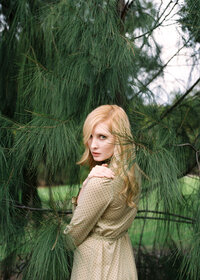 blonde-woman-in-garden-vermont-melbourne-portrait