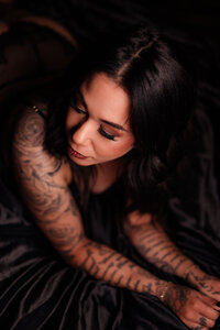 Woman photographed in a casual non-lingerie look during an editorial boudoir session near Wichita.