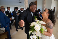 couple-happy-dancing-grand-entrance-wedding