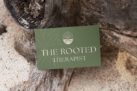The Rooted Therapist custom brand identity displayed on a green printed brand card