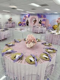 pastel pink and lavender tablescape with balloons and backdrop - butterfly themed baby shower