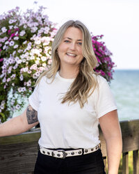 Portrait of the therapist behind Adventurous Heart Therapy, a Detroit private practice with an adventurous and personality-driven brand
