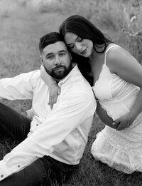 Black-and-white maternity portrait of an expecting couple captured by Angie Rich Photography, a San Antonio maternity photographer.