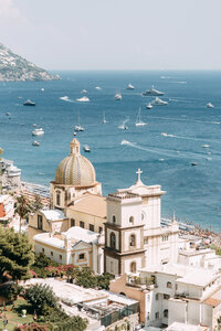 Aerial view of the rugged Amalfi Coast cliffs and turquoise Mediterranean Sea