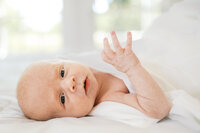 A newborn baby boy close up photo during a newborn photography session in Wilmington, North Carolina
