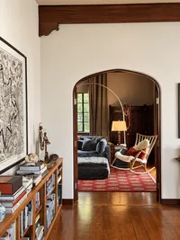 Arched Hallway to Cozy Reading Room
