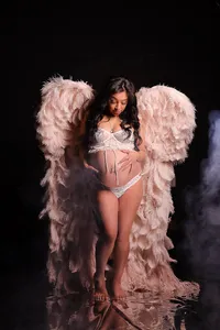 Maternity boudoir photography created by Avid Artistry in the Wichita area.