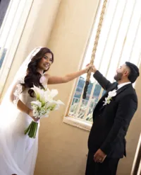 Newlywed couple ringing the wedding bell at Chapel Dulcinea after their ceremony in the Texas Hill Country.