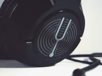 Custom therapy practice logo displayed on a headphone mockup
