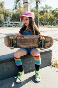 Personality-driven brand photography for Adventurous Heart Therapy featuring an outdoor portrait with a skateboard