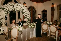Bride and Groom toast during Maid of Honor speechWedding reception detail at Nashville venue — planned by Weddings & Events by Raina