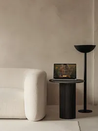 Phillipa Leseberg Showit website displayed on a laptop in a neutral editorial interior.
