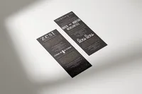Black Zest Clothing & Co. printed cards featuring promotional messaging and typography.