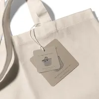 French market tote with custom Crème de la Crème product tags.
