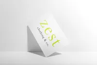 Minimal white Zest Clothing & Co. tent card with lime green and black typography.