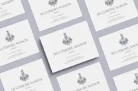 Muchmore Maison printed brand collateral featuring the logo and floral identity details.