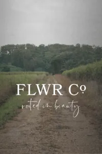 FLWR Co script logo over a misty meadow photograph