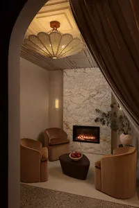 msb-interior-design-wellness-co-arched-fireplace-lounge