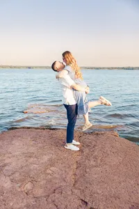 man-picking-up-woman-engagement-session