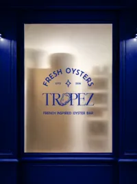 Window mockup for oyster and wine bar branding
