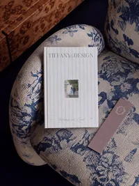 Luxury wedding planner branding for Tiffany & Design shown on a mockup of a brand magazine/book with a pink bookmark