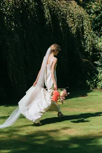 u3981682316_documentary_wedding_photograph_of_a_bride_crossin_8eec1d44-36de-47d1-a8d2-9cd1c5f2bee6_2