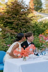 u3981682316_candid_wedding_photograph_of_newlyweds_seated_tog_8fa4bf19-ebfd-4e27-8395-80fd77133ea2_0