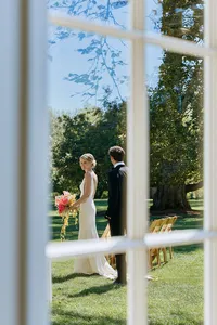 u3981682316_observational_wedding_photograph_through_a_white__25ae41fe-8106-493f-ba46-c7c10c9e485f_1