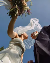 u3981682316_httpss.mj.run50kEyBEhSPY_low_angle_wedding_photo__743457f5-1949-4869-9f94-6db13609bd54_2