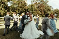 Bride and groom during barn wedding ceremony at Mason Farms in North Georgia, shot by Crimson Conure Photography based in Denver, Colorado and Kennesaw, Georgia