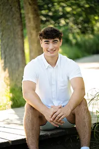 Minneapolis senior photographer capturing a high school senior portrait outdoors in Minnesota.