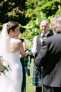 Bride sharing a quiet moment with family before the ceremony