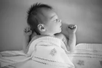 black and white home newborn session photos