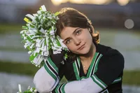 Cheerleader senior pictures girl sunset Indiana senior portraits