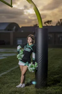 Cheerleader senior photos girl poses Indianapolis senior photography