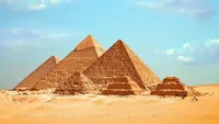 Ancient Egyptian pyramids rising from the desert near Cairo
