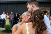 bride-hugging-grooms-mother-intimate-wedding-kansas-city