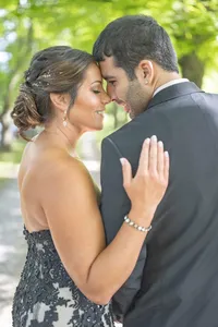 Wedding couple sharing an intimate portrait at Lowndes Grove in Charleston SC photographed by Amberlee Christey.