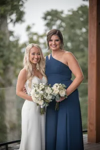 amberlee-christey-photography-wilderness-lodge-rainy-bridal-party-family-photos-74