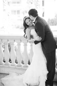 Black and white portrait of a bride and groom at The Breakers in Palm Beach, Florida, photographed by Amberlee Christey Photography.